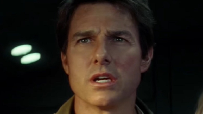 Tom Cruise vacantly staring