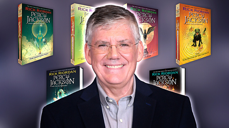 Rick Riordan with his books