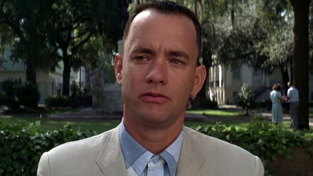 Forrest Gump in a light-colored suit