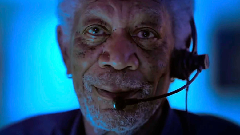 Morgan Freeman talks into a headset