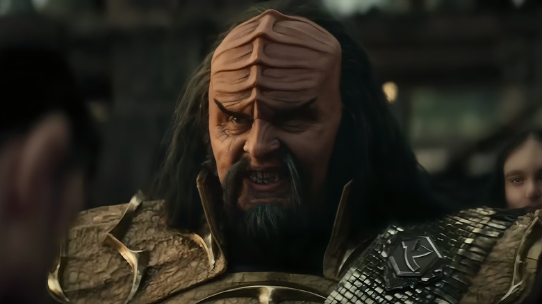 A Klingon smiles devilishly 