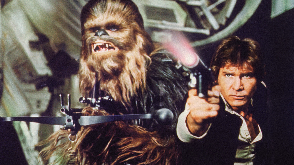 Han and Chewie with blasters 