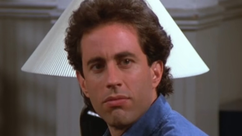 Jerry Seinfeld looking over shoulder