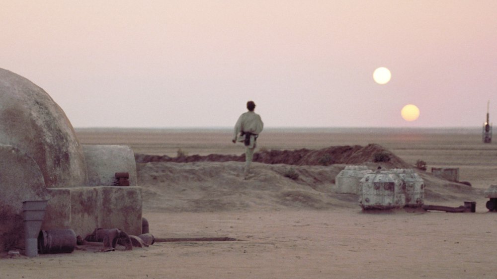 Luke Skywalker takes in Tatooine's binary sunset
