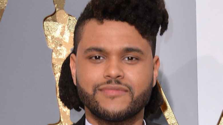 The Weeknd posing at Oscars