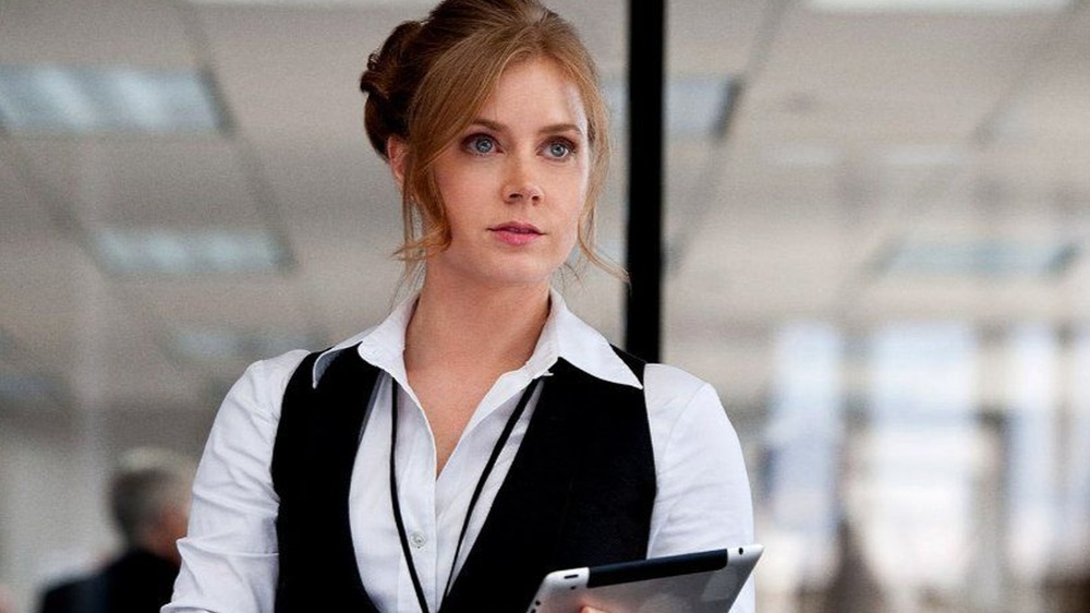 Lois Lane holding a tablet