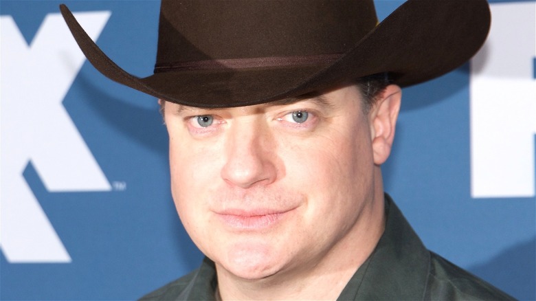 Brendan Fraser wearing a cowboy hat