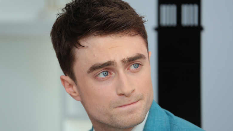 Daniel Radcliffe glances to side