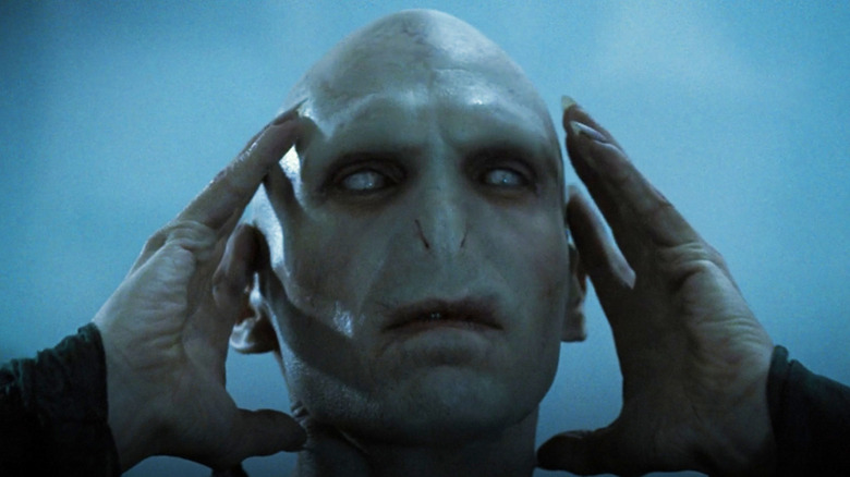 Lord Voldemort touching face