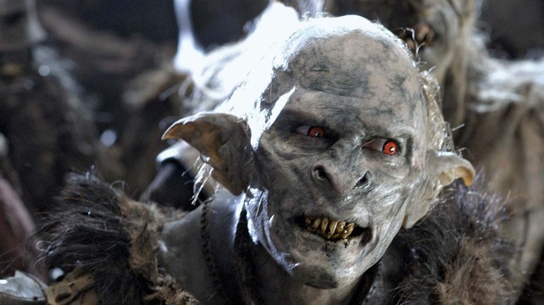 Orc with red eyes snarling