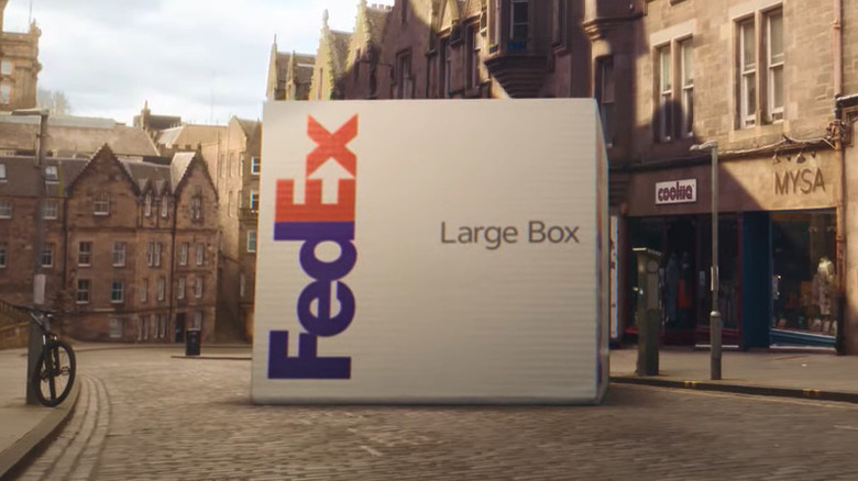 Large FedEx Box cobblestone street